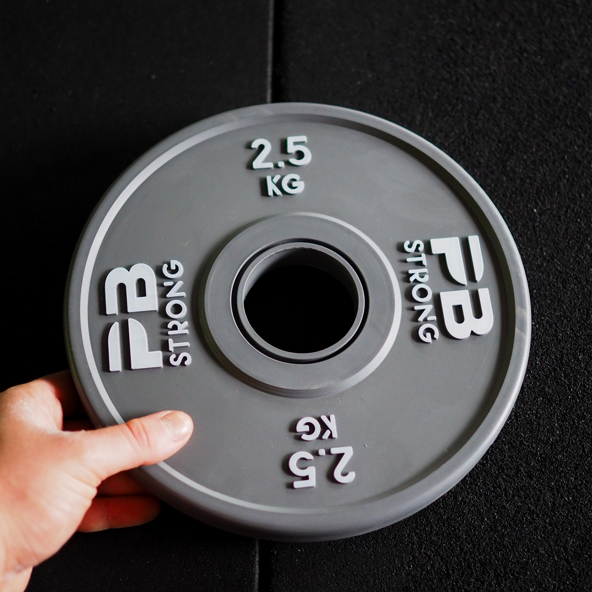 Disque d'haltère de compétition PB Strong (à l'unité) gris 2,5 kg